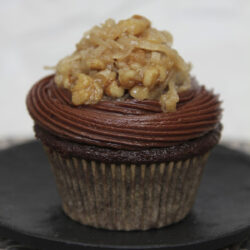 A plate with German chocolate cupcake.