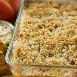 Biscoff crumble in a glass baking dish.