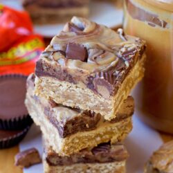 A stack of Reese's bars with swirled chocolate and Reese’s chunks.