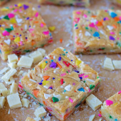 Close-up of Funfetti blondies with colorful sprinkles.