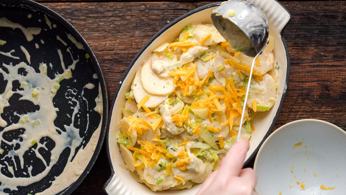 Gratin being assembled before baking.