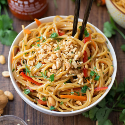 Thai chicken noodle bowl on a table.