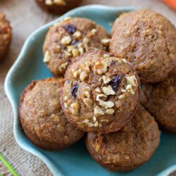 Healthy carrot cake muffins in a blue dish.