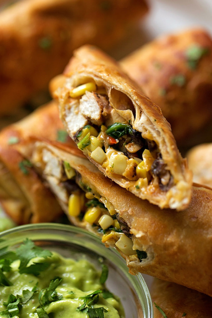 Southwest Egg Rolls cut in half to reveal the hearty filling