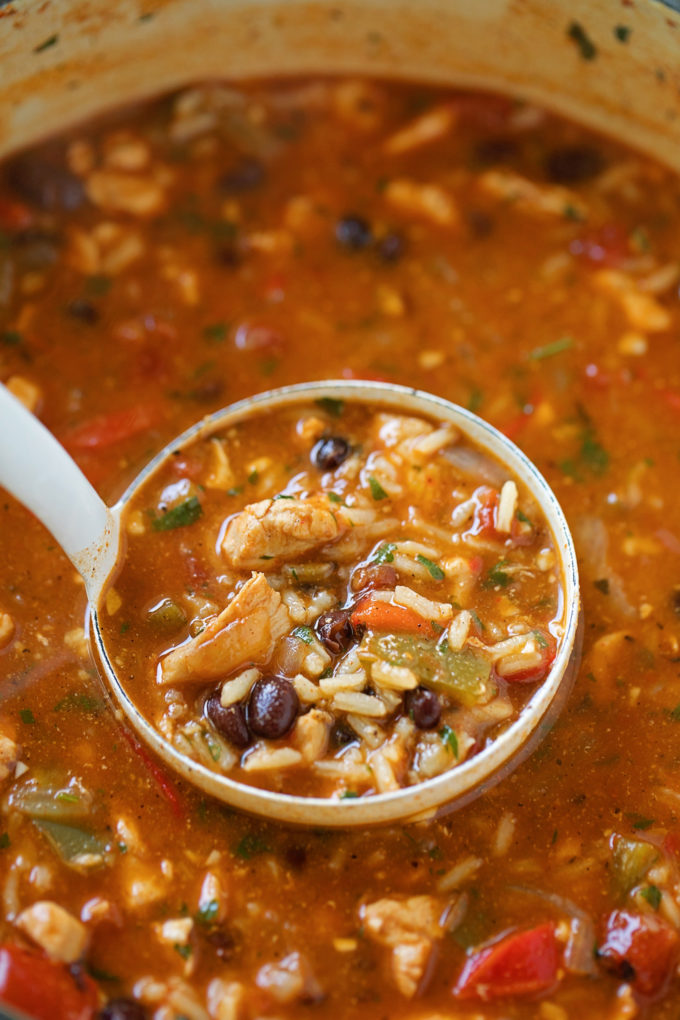 A ladle full of fajita soup.