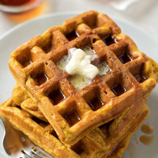 A stack of hot pumpkin spice waffles.