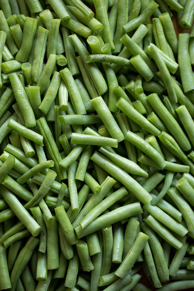 Fresh cut green beans ready to be used in creamy green bean casserole.