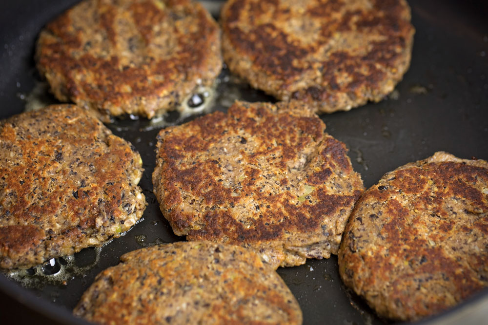 Quick and easy black bean burgers make a tasty alternative to their meat counterparts. Tasty AND healthy, what could be better? Homemade black bean burger patties
