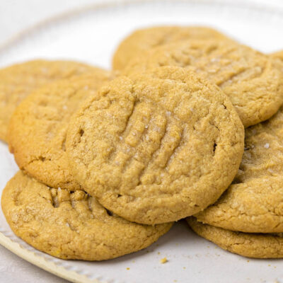 Five ingredient peanut butter cookies arranged on a plate.