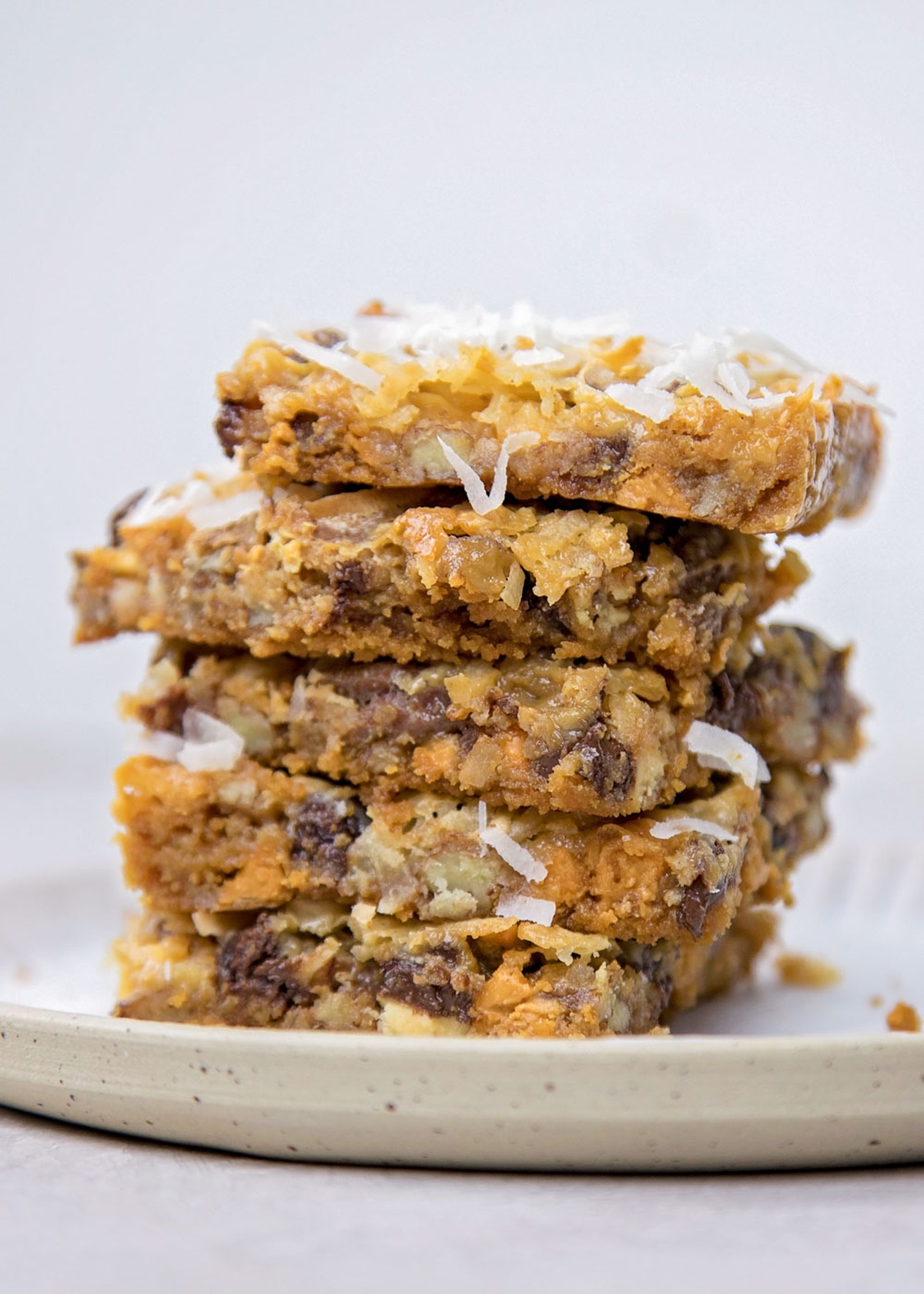 A stack of baked old-fashioned 7 Layer Bars.