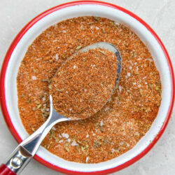 Homemade taco seasoning in a white bowl.