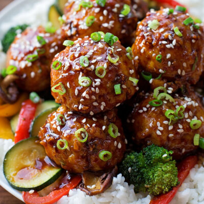 A plate with Asian Meatballs served with rice.
