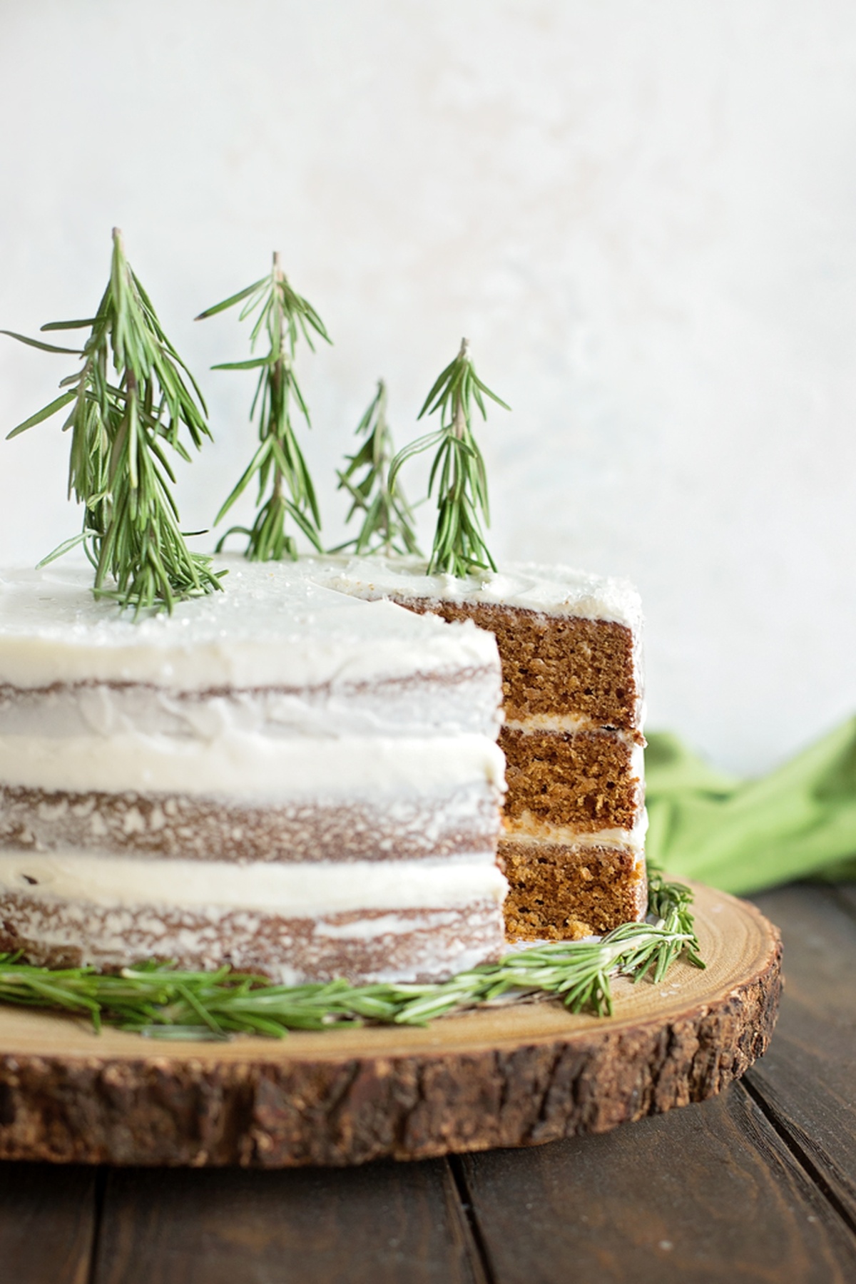 A gingerbread spice cake with a slice cut out.
