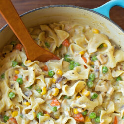 A skillet with Chicken Pot Pie Pasta.