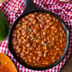 A skillet with Oven Baked Beans.