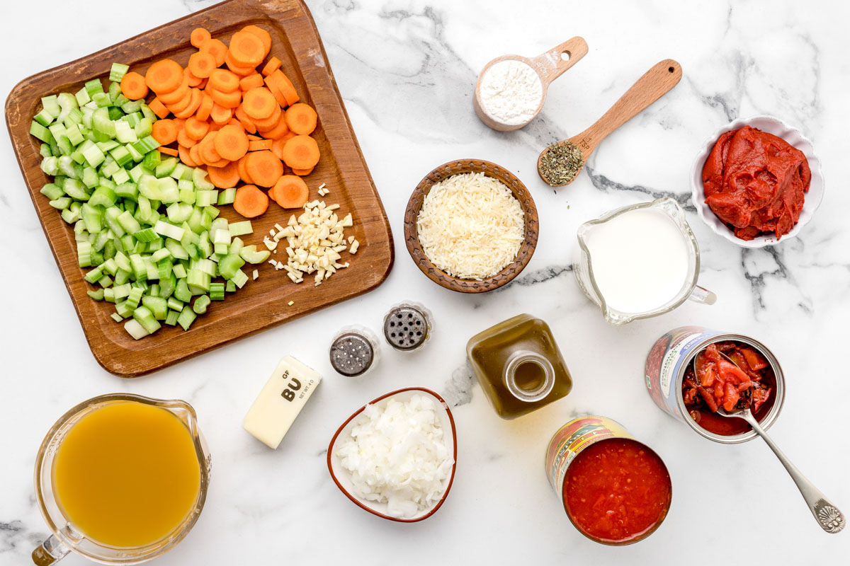 Chopped veggies and ingredients for instant pot tomato soup recipe