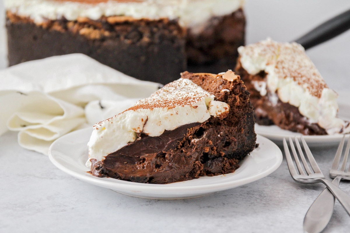 A close-up of a sliced piece of Mississippi Mud Pie served on a plate.