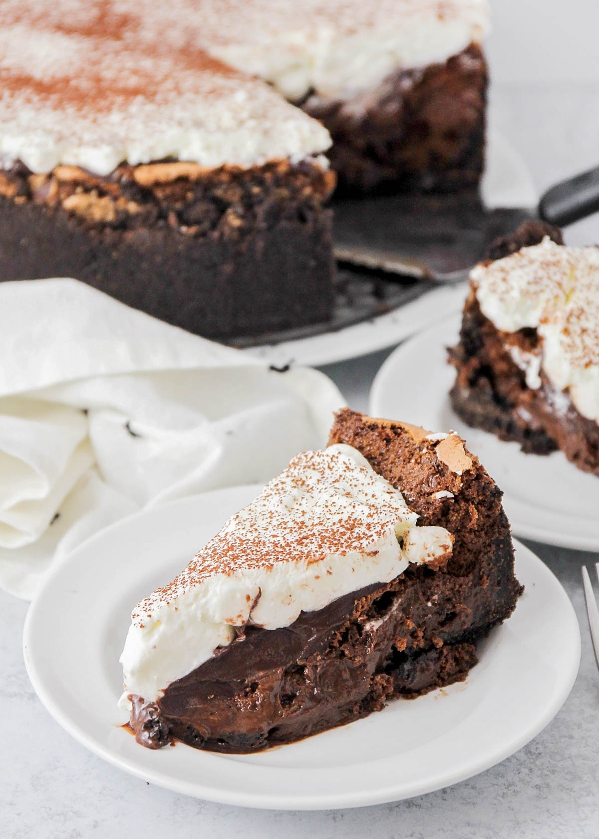 Two slices of Mississippi Mud Pie served on plates.