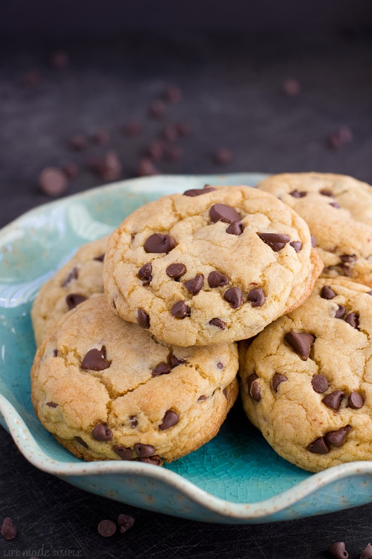 A bowl filled with soft-batch chocolate chip cookies.