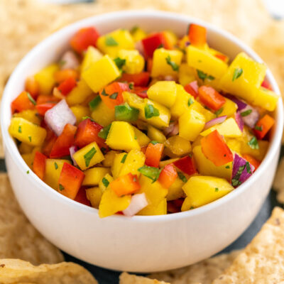 This Mango Pico de Gallo recipe is full of fresh and crisp fruits and veggies and makes the perfect dip or topping to any dish!