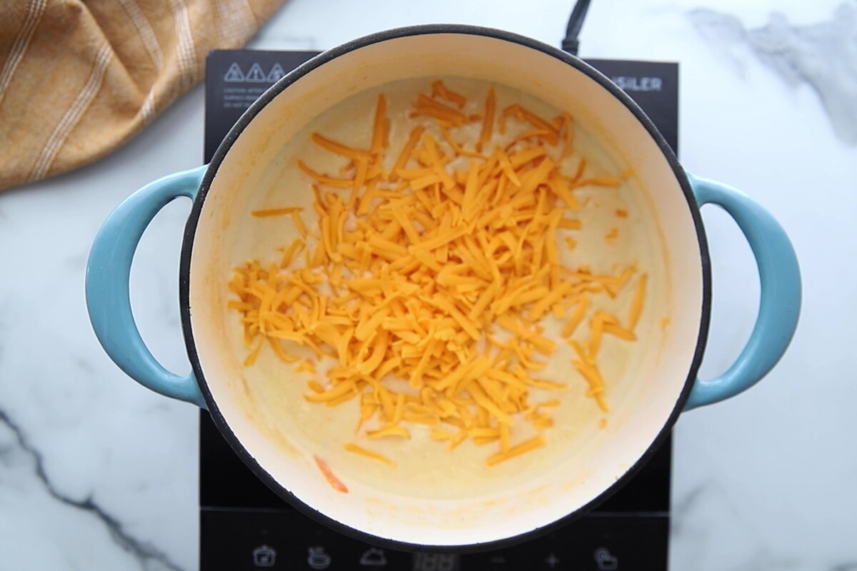 Added cheese to the pot.
