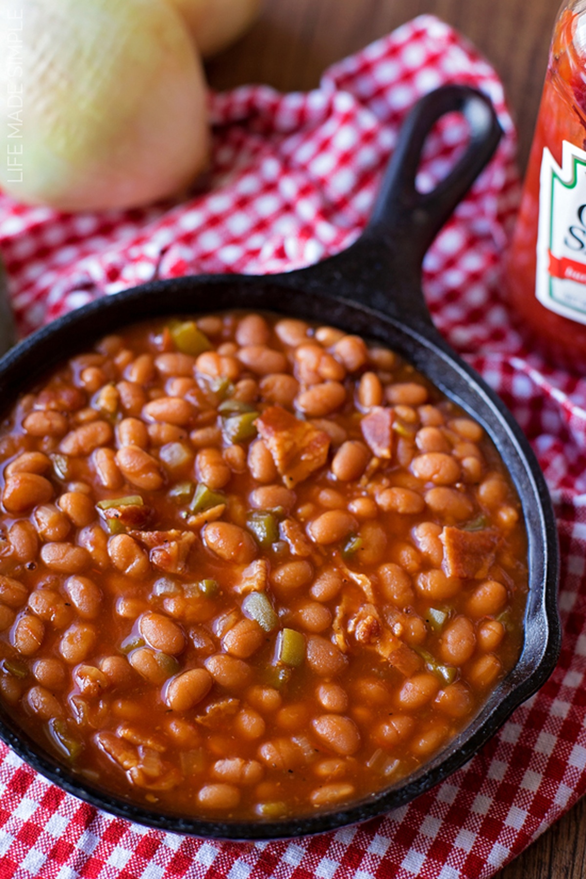 A skillet with Oven Baked Beans.