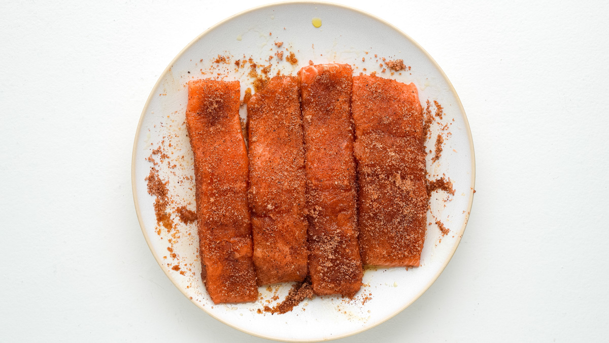 Spice rub added all over the salmon fillets.