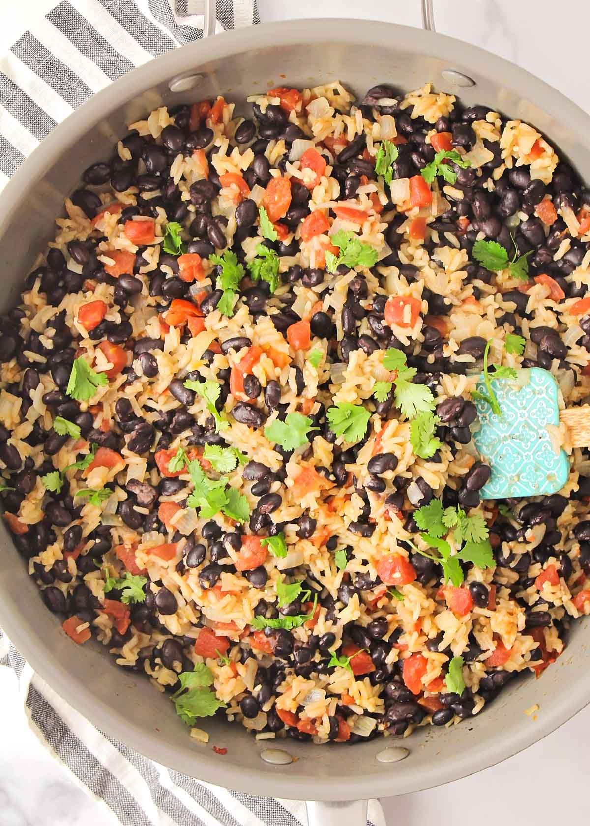 Black beans and rice in a skillet.