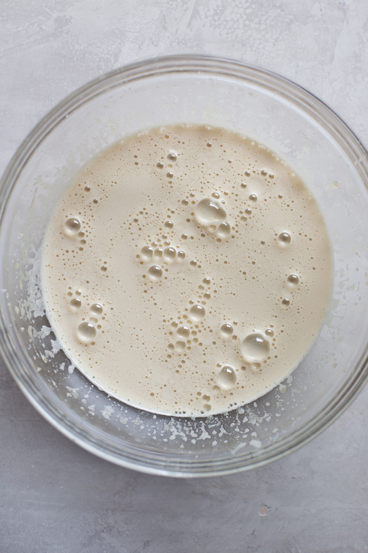 Sugar and oil in a glass bowl.