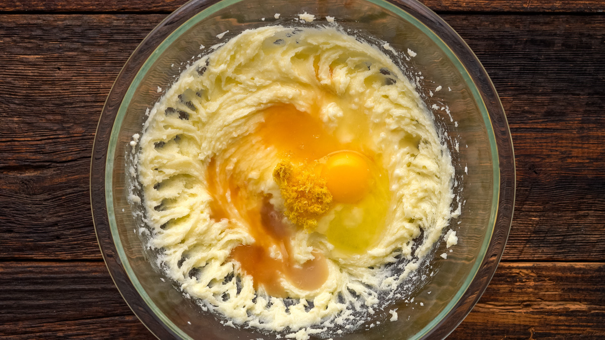 Egg, vanilla, lemon juice, lemon zest, and lemon extract, added into the wet ingredients.
