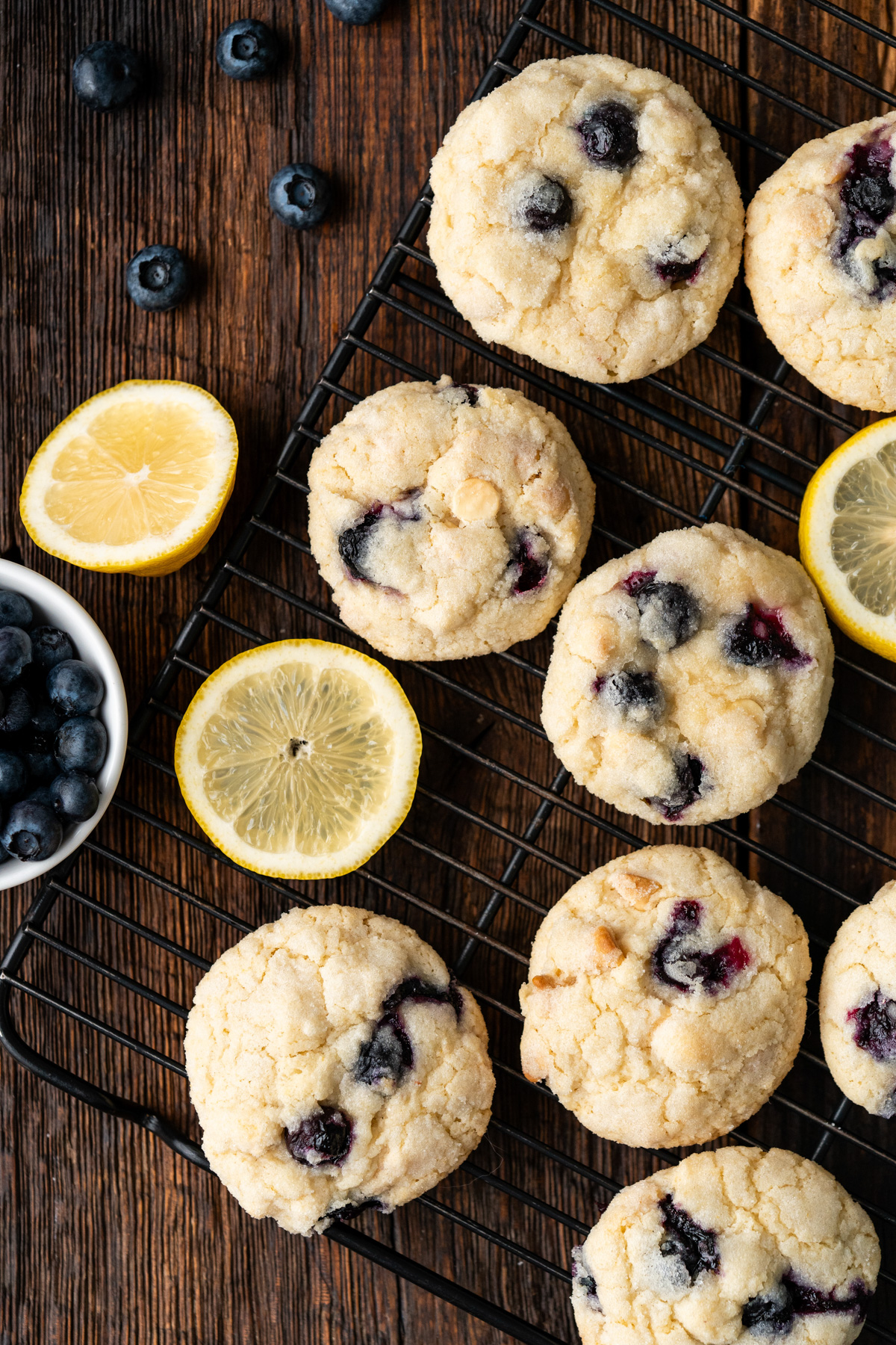 Lemon blueberry cookies on a wire rack.