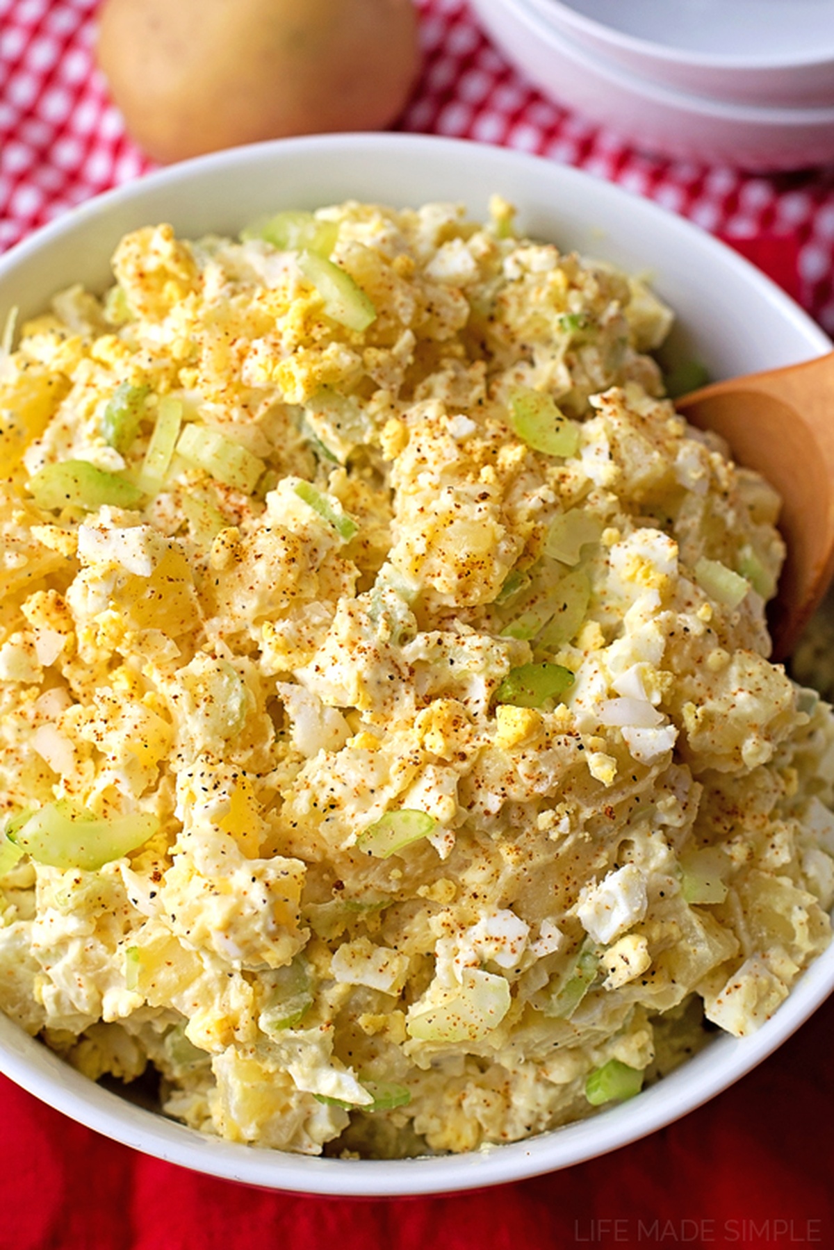 A bowl filled with classic potato salad.