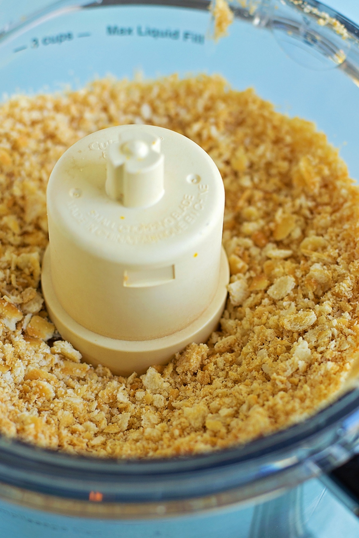 Crushed cracker crumbs in a food processor.