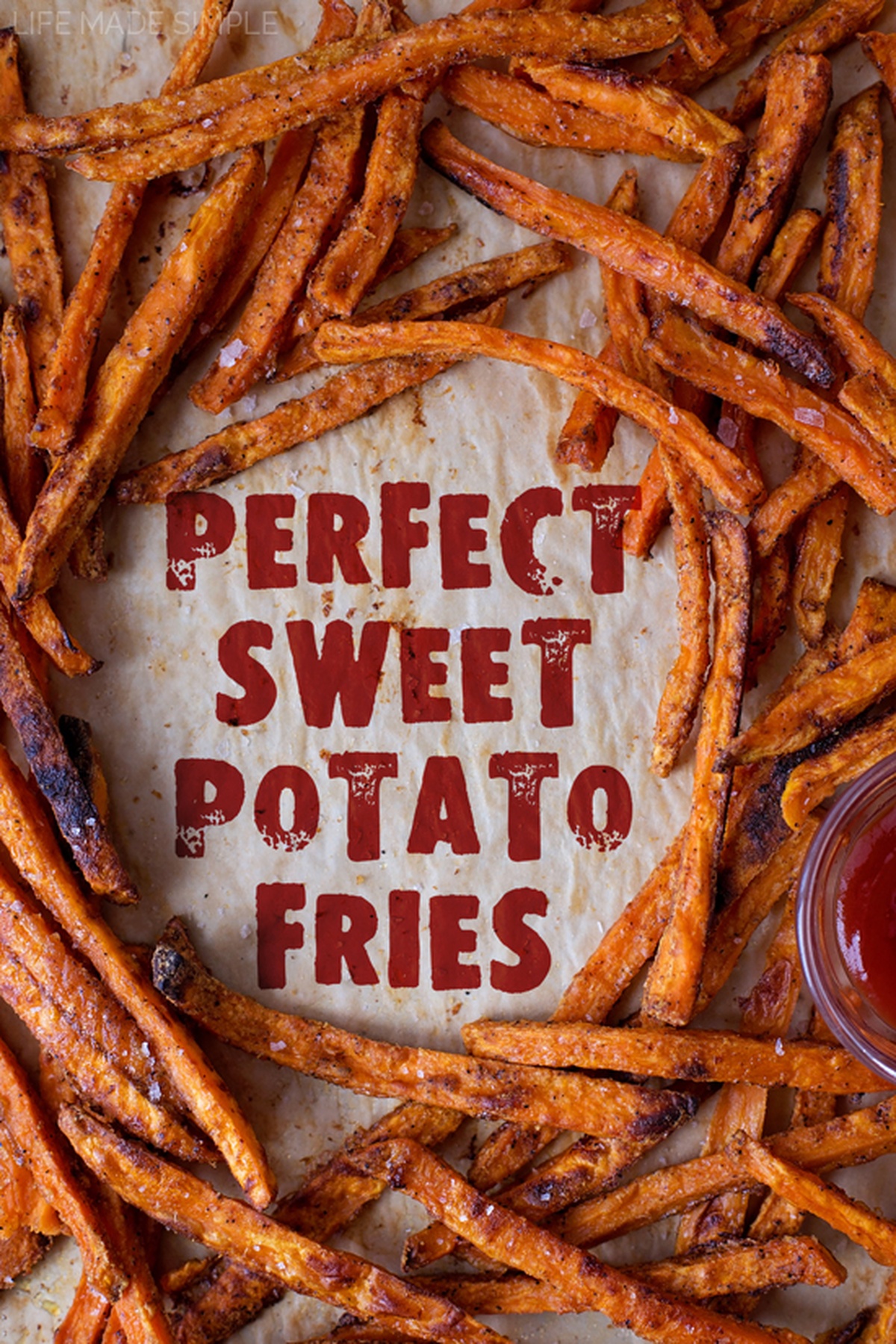 Baked sweet potato fries on a tray.