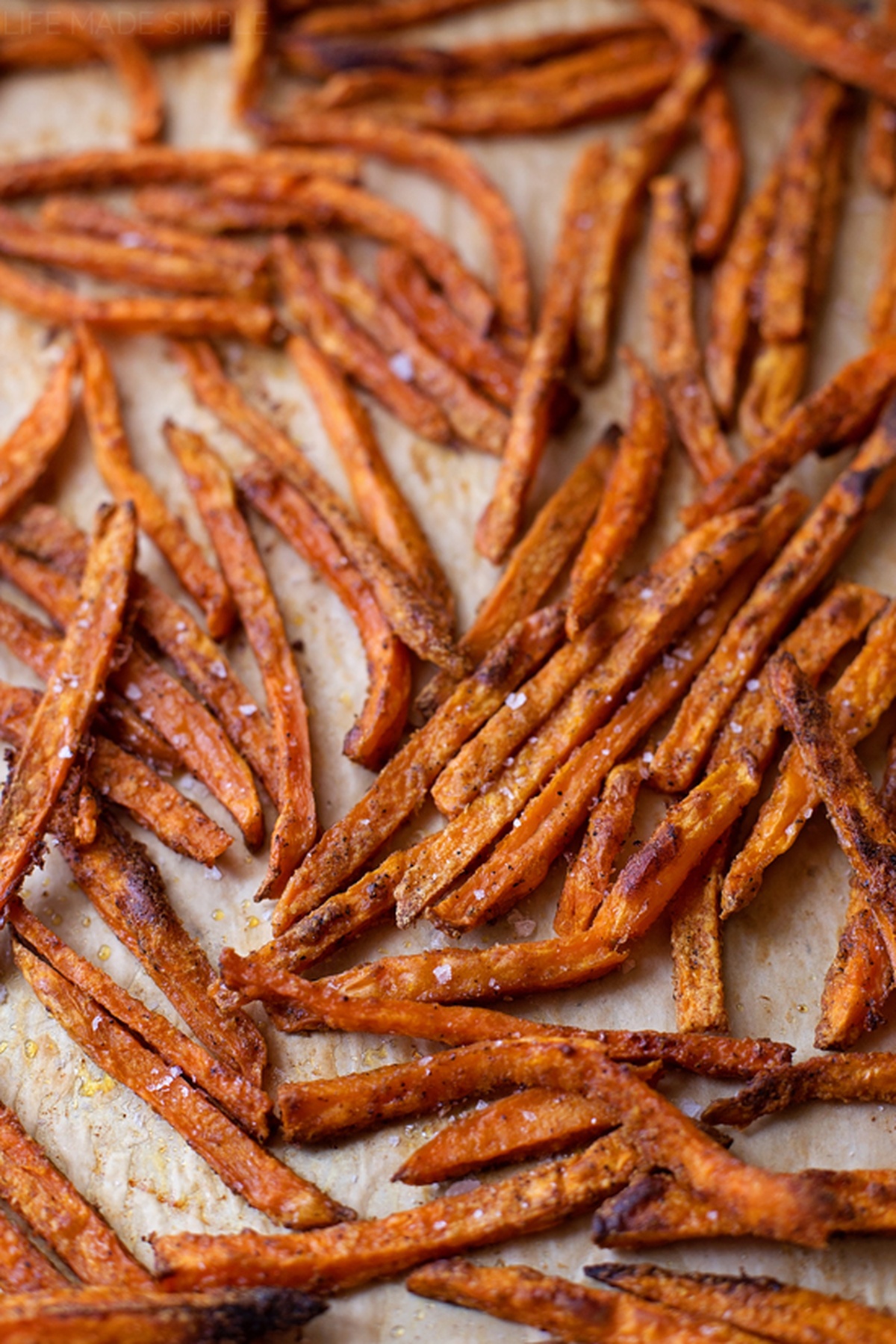 Spread of baked sweet potato fries with a golden crispy texture.