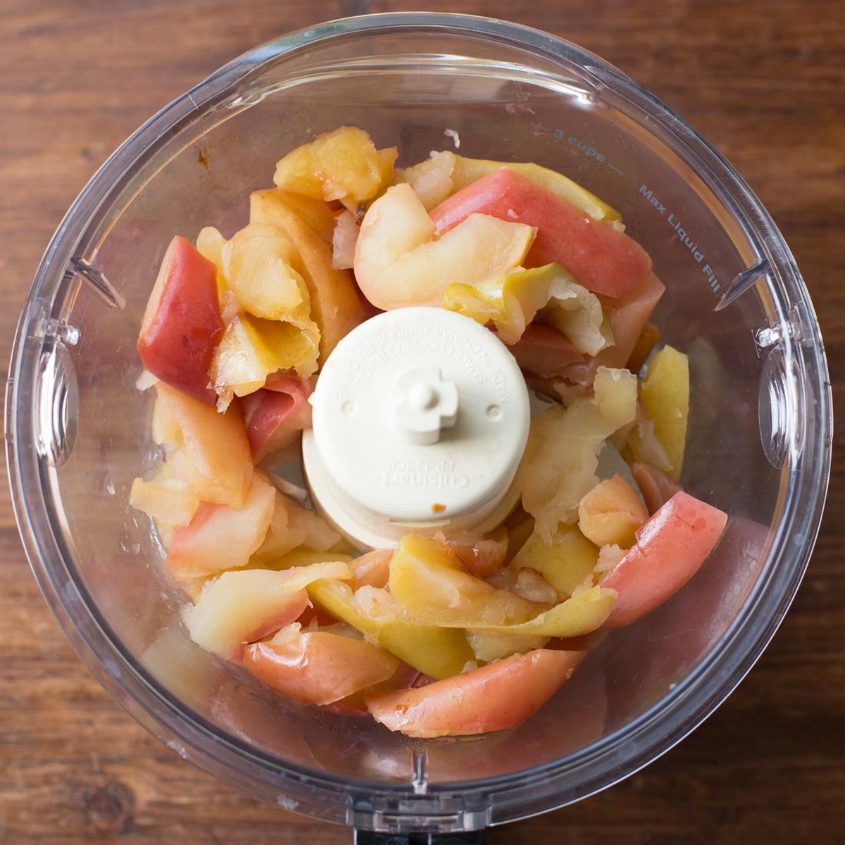 Chopped apples in a food processor.