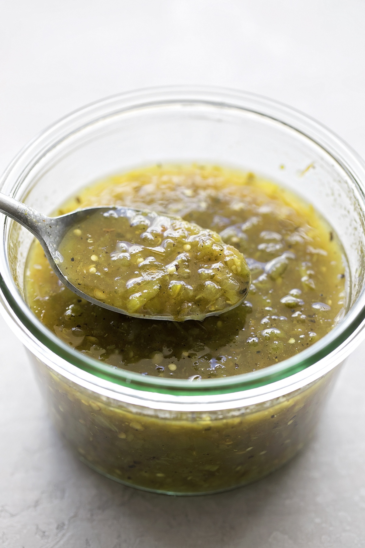 A jar of freshly made green salsa.