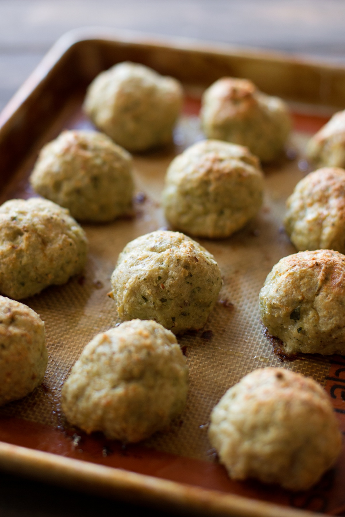 Ground chicken mixture in a mixing bowl.