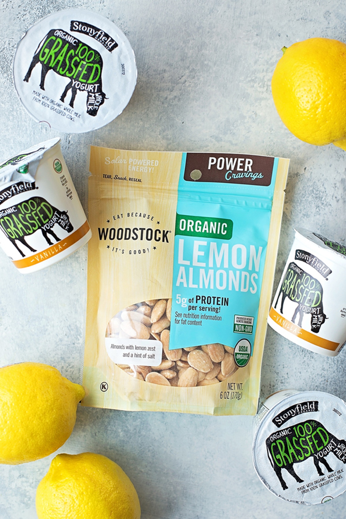 Ingredients for lemon poppy seed scones arranged on a light background.