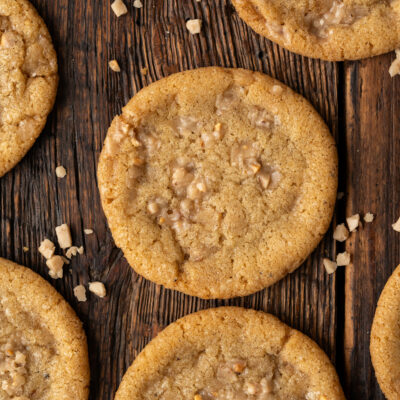 Delight in these Butter Crunch Cookies. Light, crisp, and chewy cookies packed with toffee for delectable treat any time of the day.