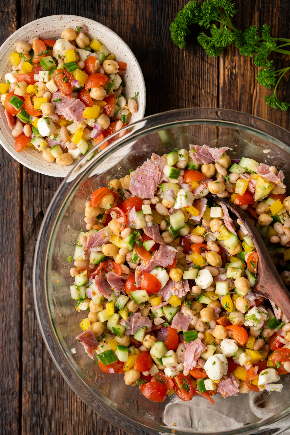 Large and small bowl filled with the dense bean salad.