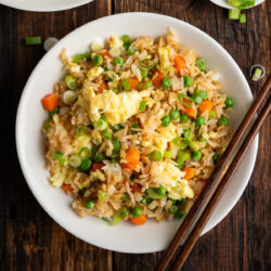 Everyone will devour this Instant Pot Fried Rice. Fluffy rice, colorful vegetables and scrambled eggs combine in one pot to create your new favorite rice dish!