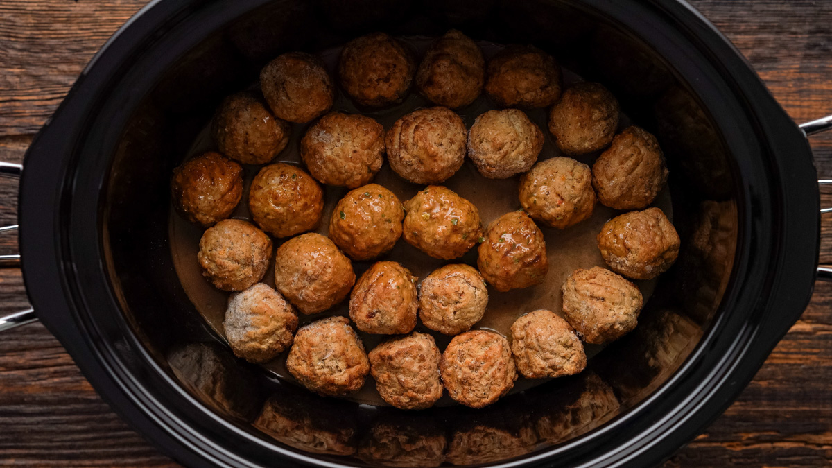 Liquid added to the meatballs in the crock pot.