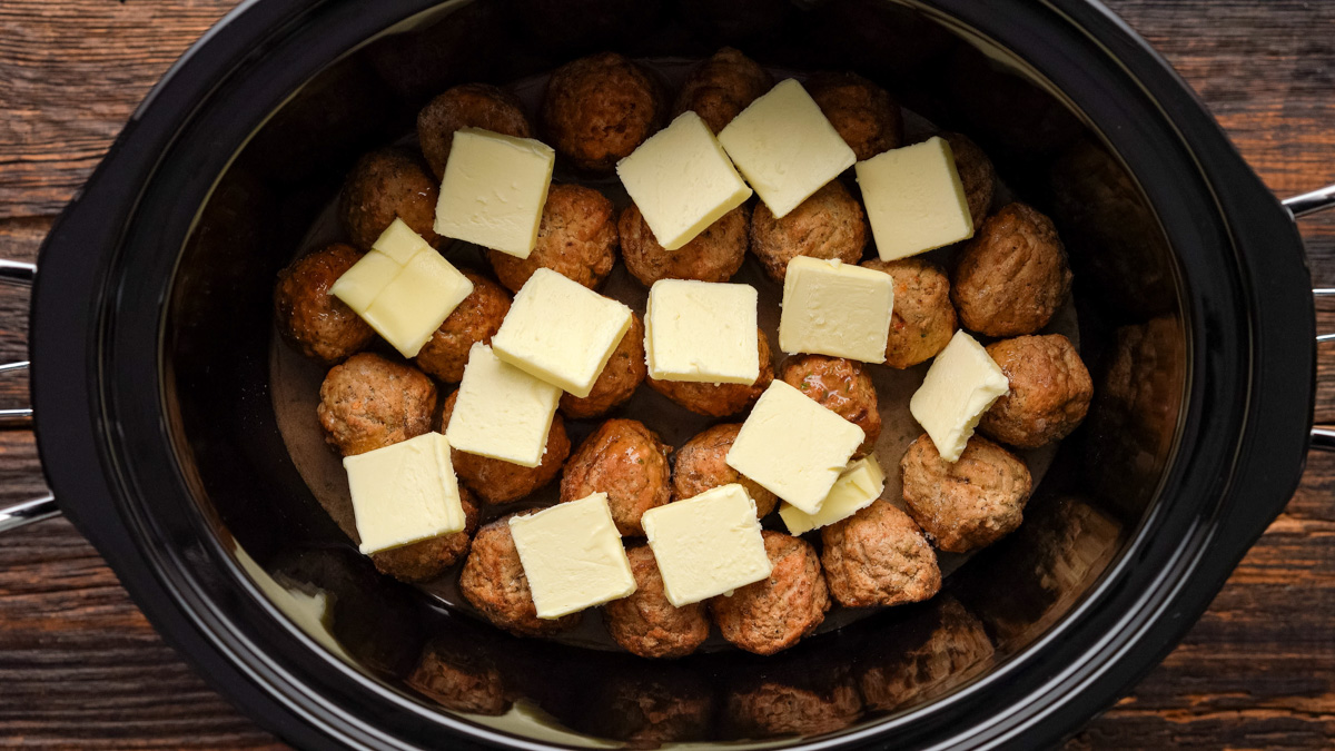 Butter added to the slow cooker.