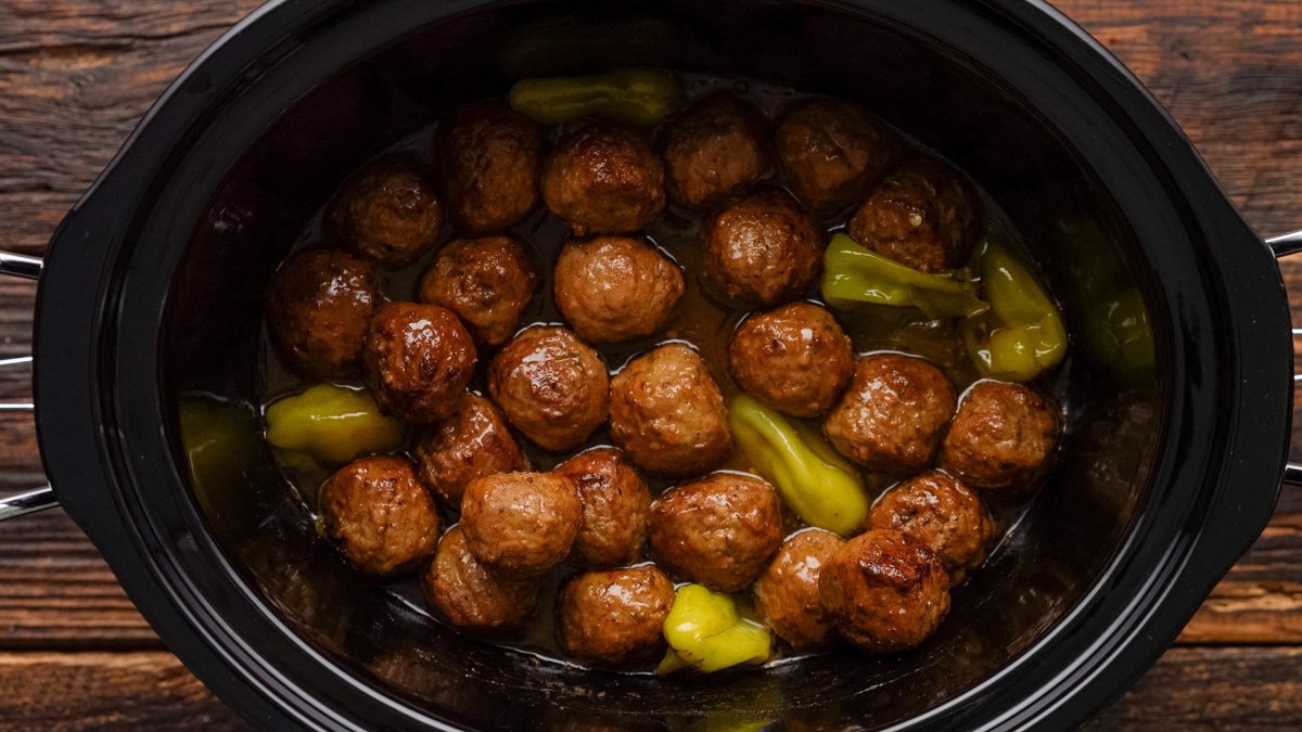 Mississippi Meatballs in a crock pot after cooking.