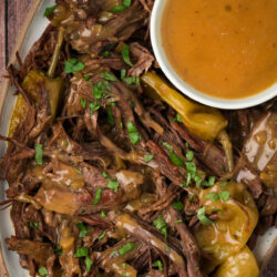 Delight in this Instant Pot Mississippi Pot Roast recipe. Tender pot roast cooked in a savory broth to create the perfect comfort meal.