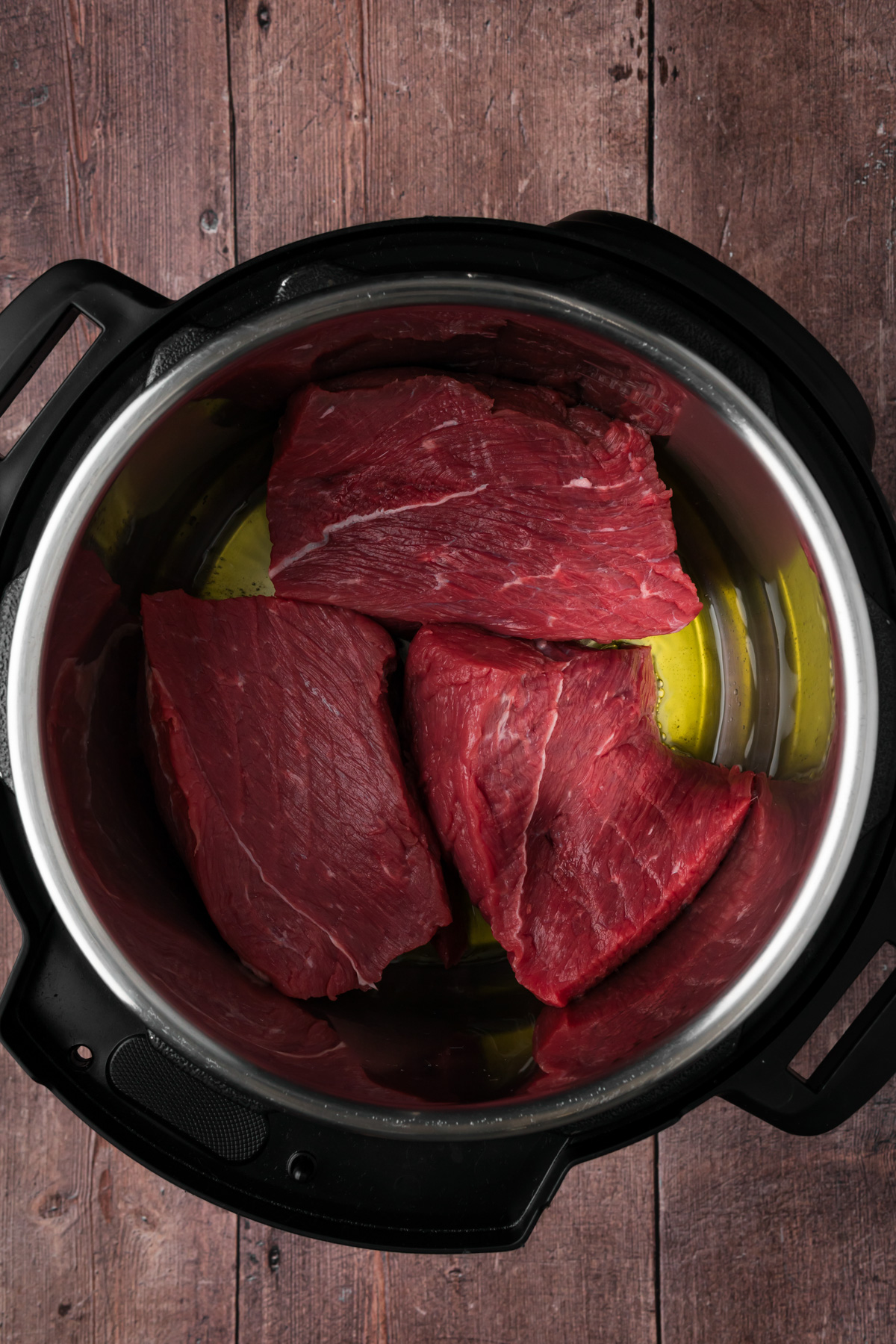 Chuck roast added to the Instant Pot.