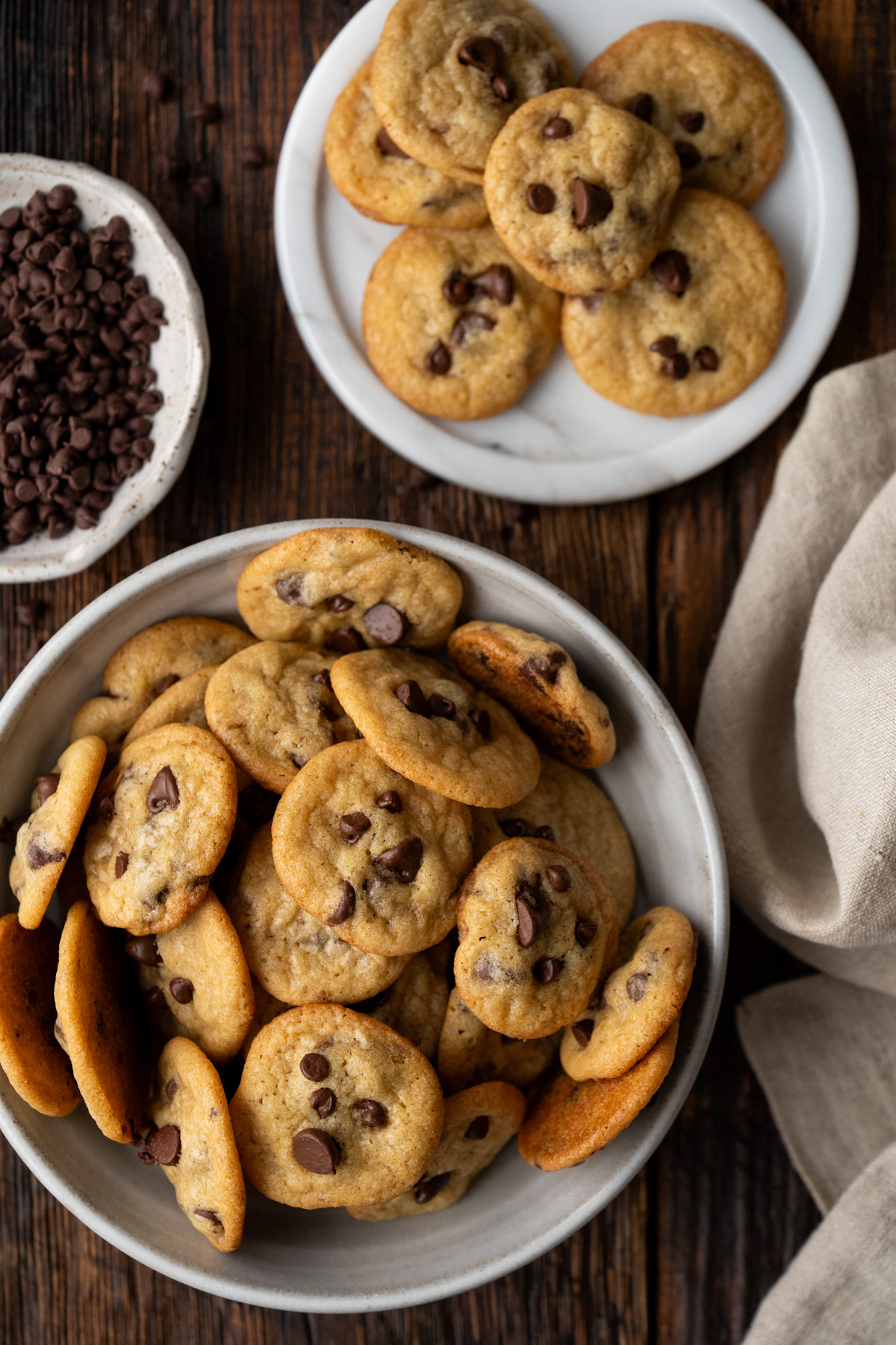 Mini chocolate chip cookies in a bowl.
