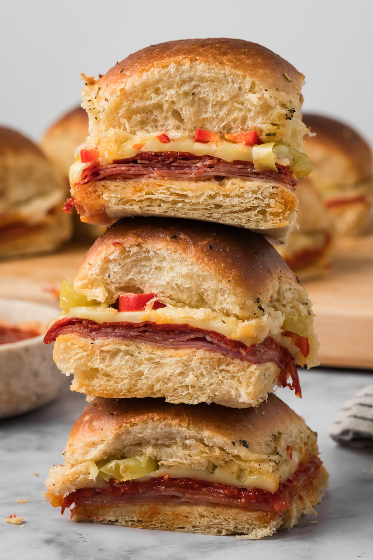 Italian sliders stacked on top of each other.