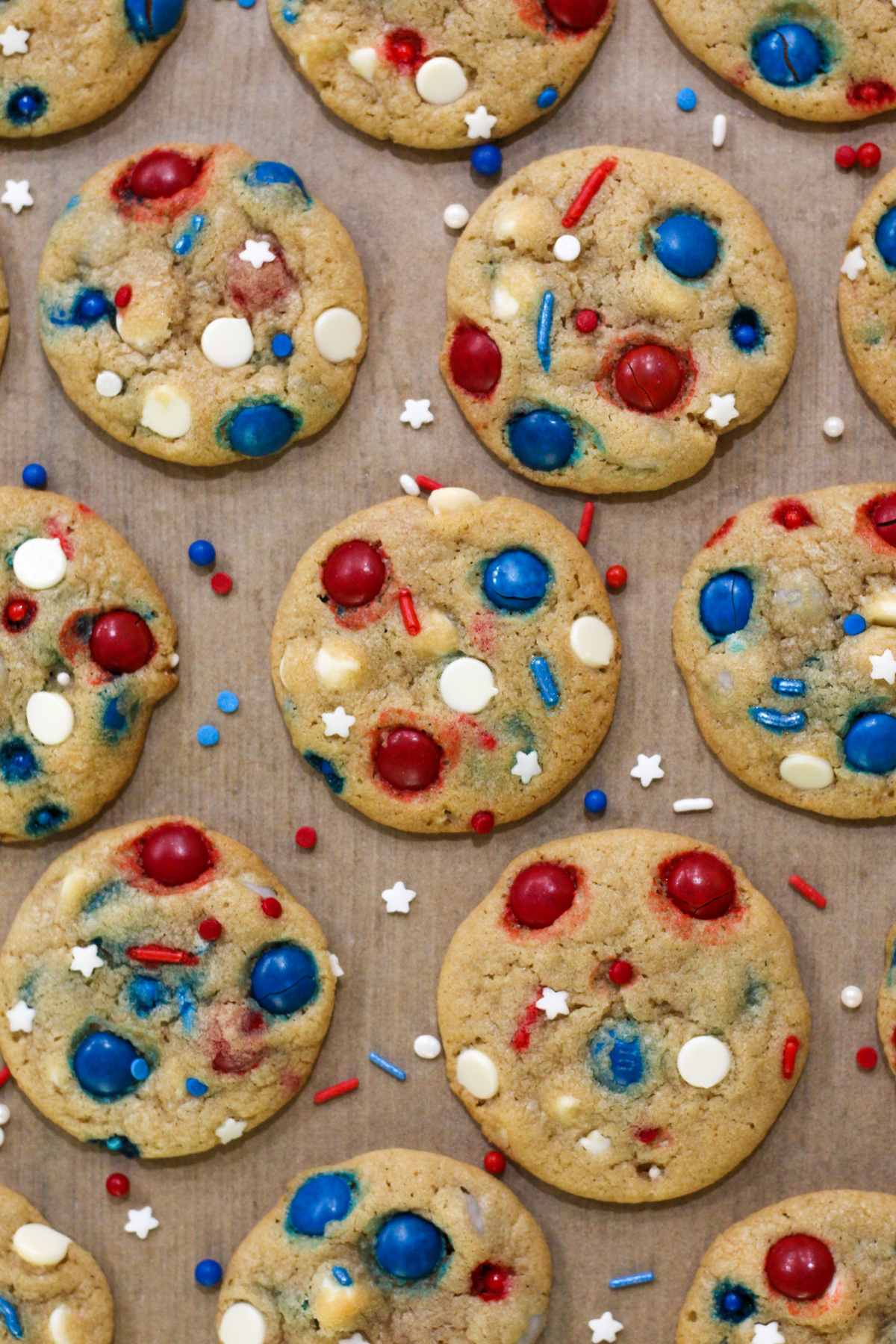 Patriotic cookies on parchment paper.